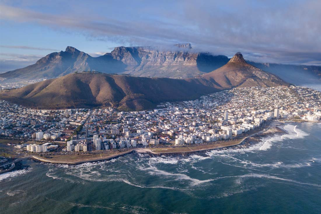 Aerial view over Cape Town, South Africa with Table Mountain to convey that KRS does remote development